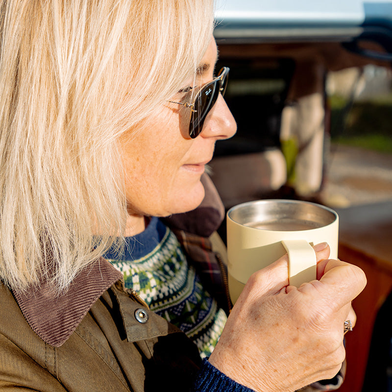 12oz-rise-mug-i9 12oz_rise_coffee_mug_wax_yellow_woman_drink_closeup_square.jpg