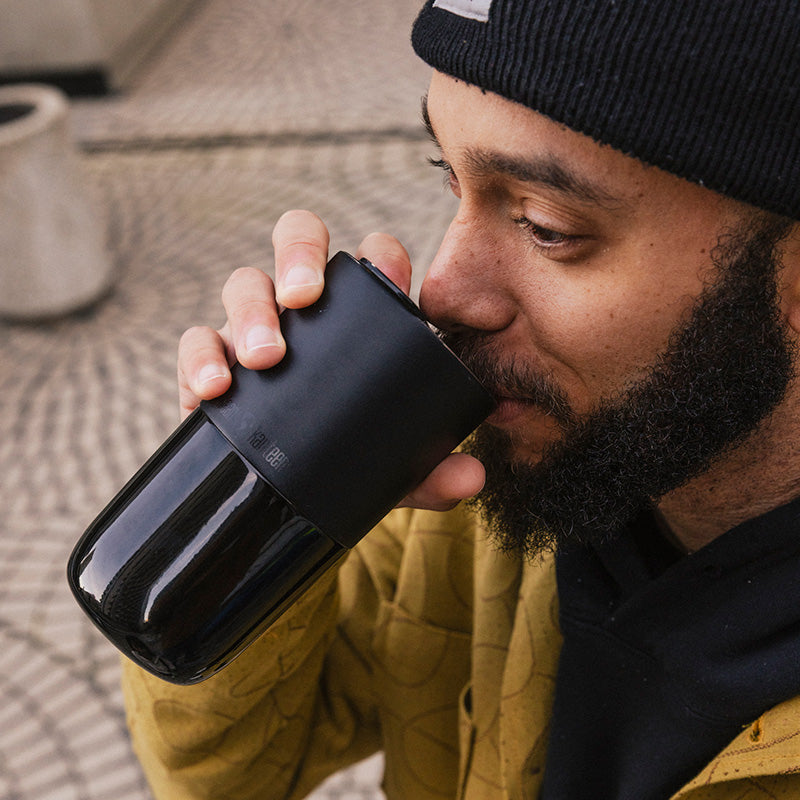16oz-rise-tumbler-a3 16oz_rise_tumbler_black_man_drink_square.jpg