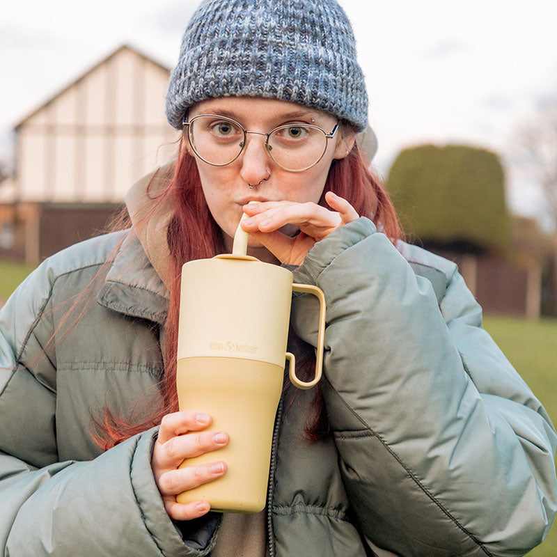 26oz-rise-tumbler-with-straw-lid-h7 26oz_rise_rumbler_straw_wax_yellow_woman_sip_square.jpg
