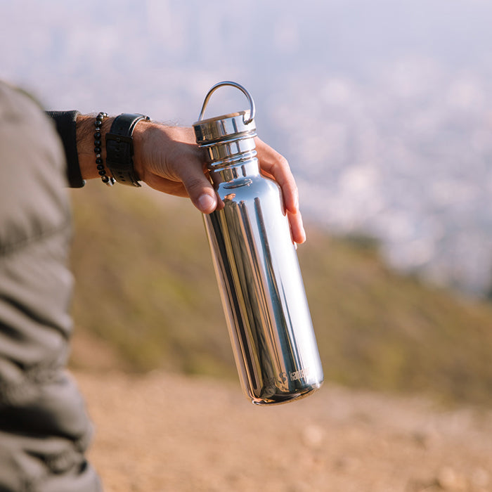 27oz-reflect-with-bamboo-cap-t1 K27SSLRF-MS-BAMBOO_reflect_bottle_hand_lifestyle.jpg
