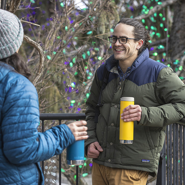 20oz-tkwide-with-cafe-cap-d1 tkwide_20oz_insulated_tumbler_cafe_winter_man_coat_yellow_square.jpg