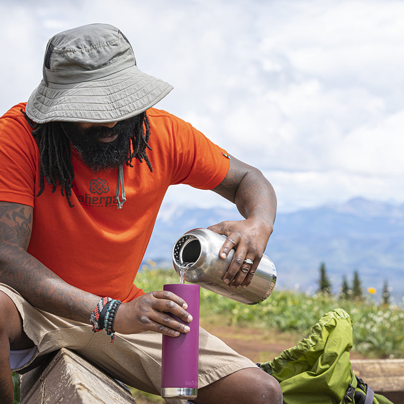 64oz-tkwide-with-loop-cap-i6 tkwide_64oz_bottle_backpacker_mountains_filling_square.jpg